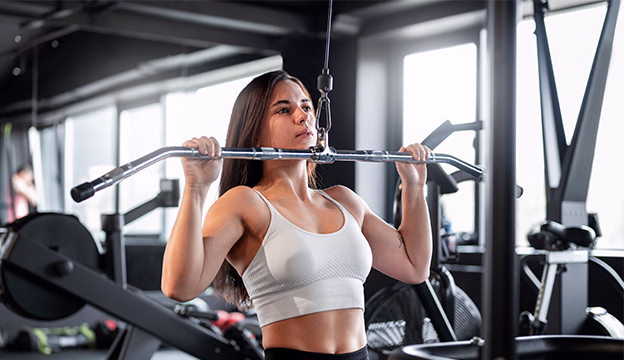 Living at Duville AVIRA: A Fitness Routine Above the City Residents enjoying strength training and fitness equipment at Duville AVIRA